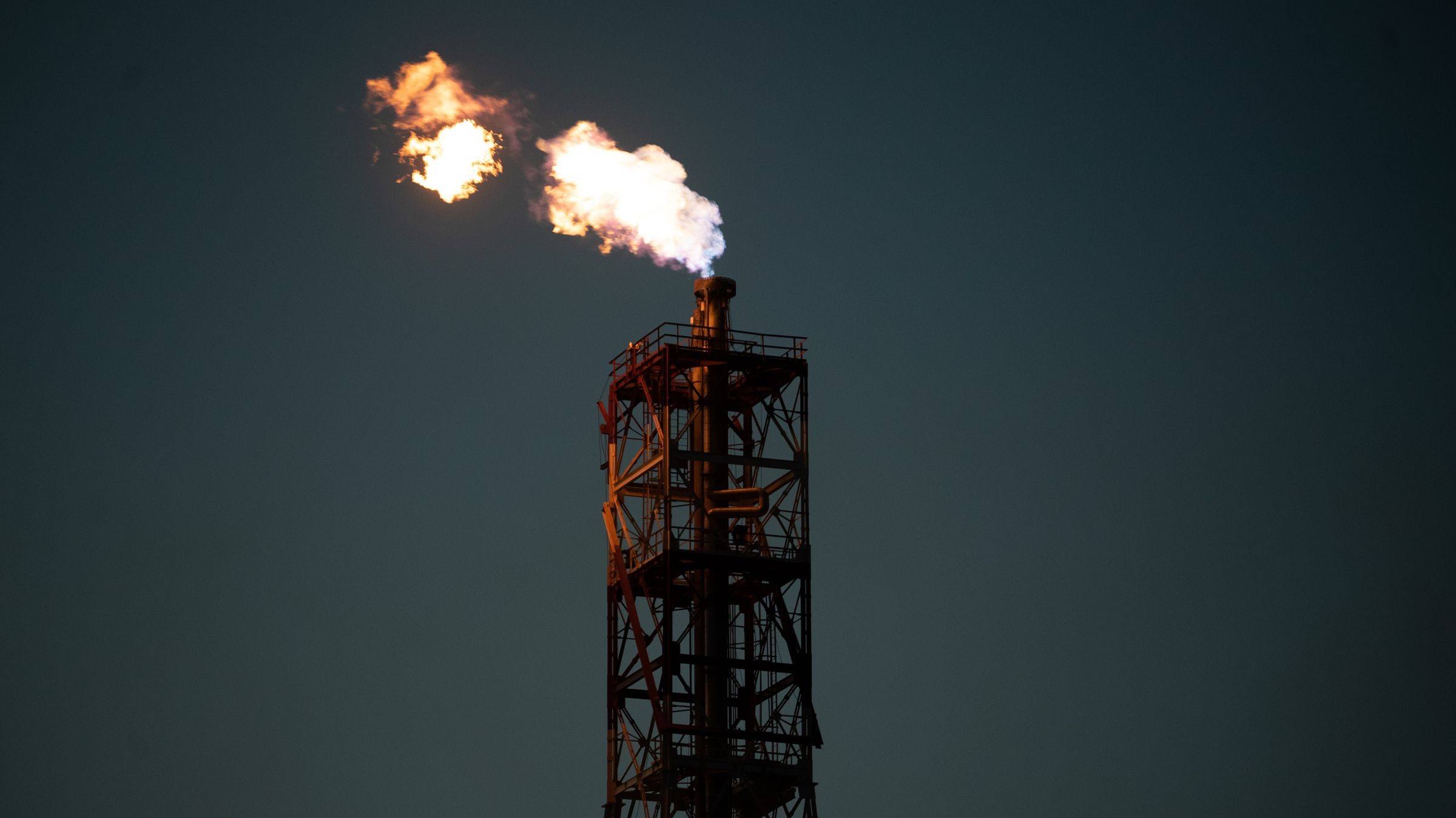 Gas flare stack at an oil facility