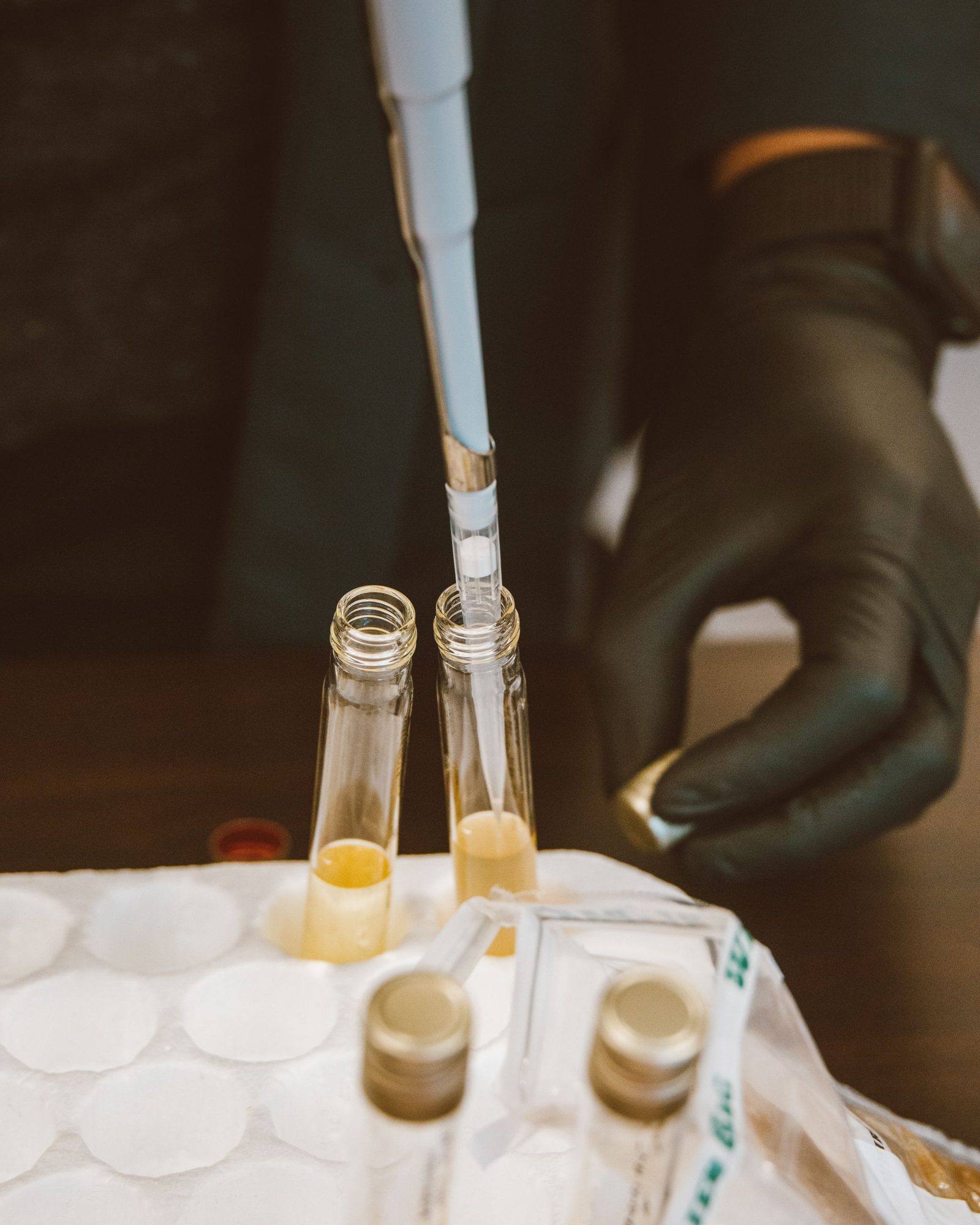 Oil samples being drawn for laboratory analysis